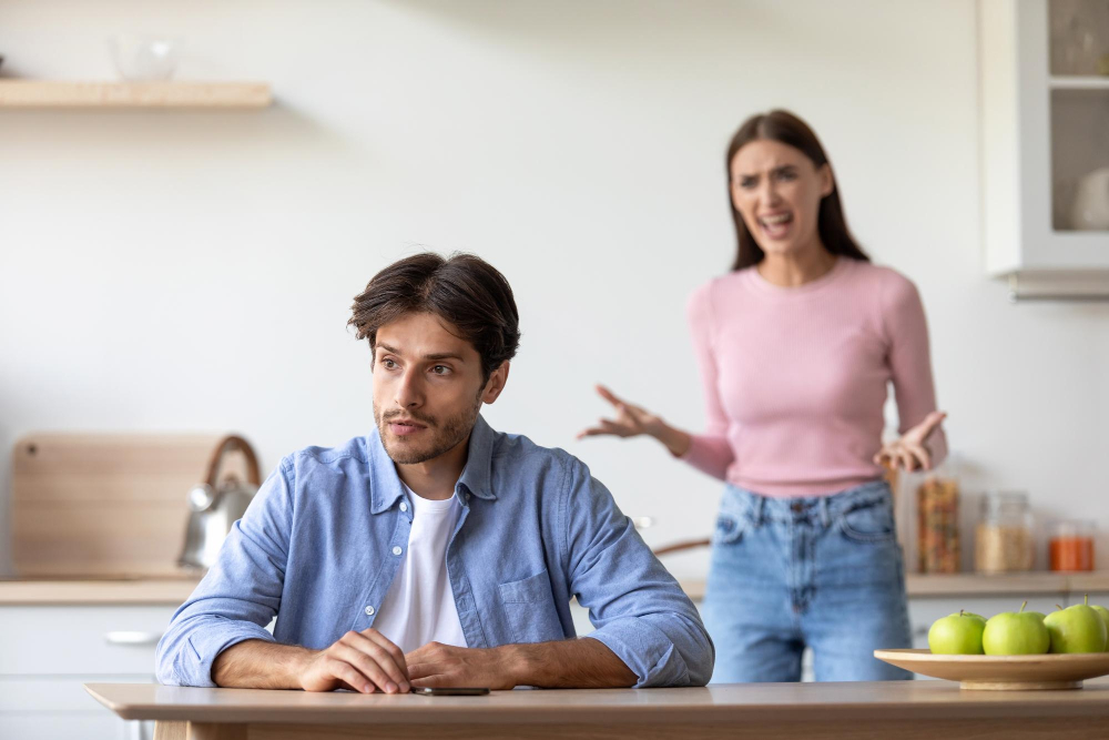 angry-aggressive-millennial-european-wife-yells-sad-depressed-husband-kitchen